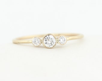 3 stone diamond engagement rings uk