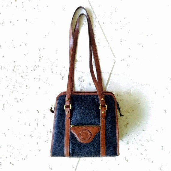 dooney and bourke navy and tan purse