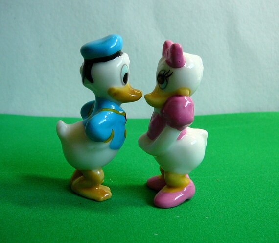 donald and daisy duck figurines