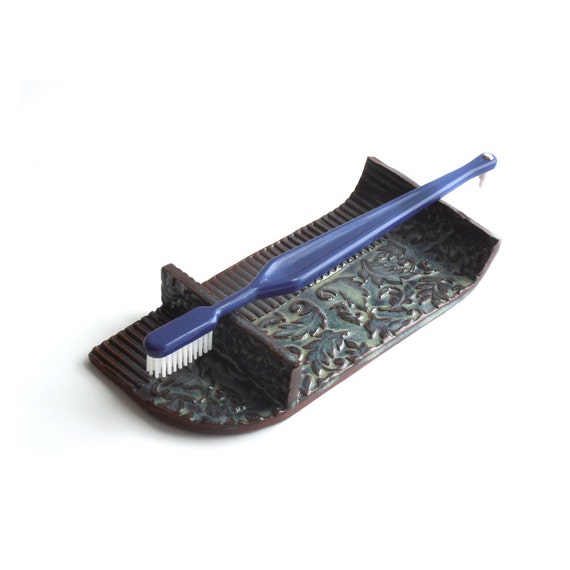 Double ended toothbrushes horizontal holder Blue green color
