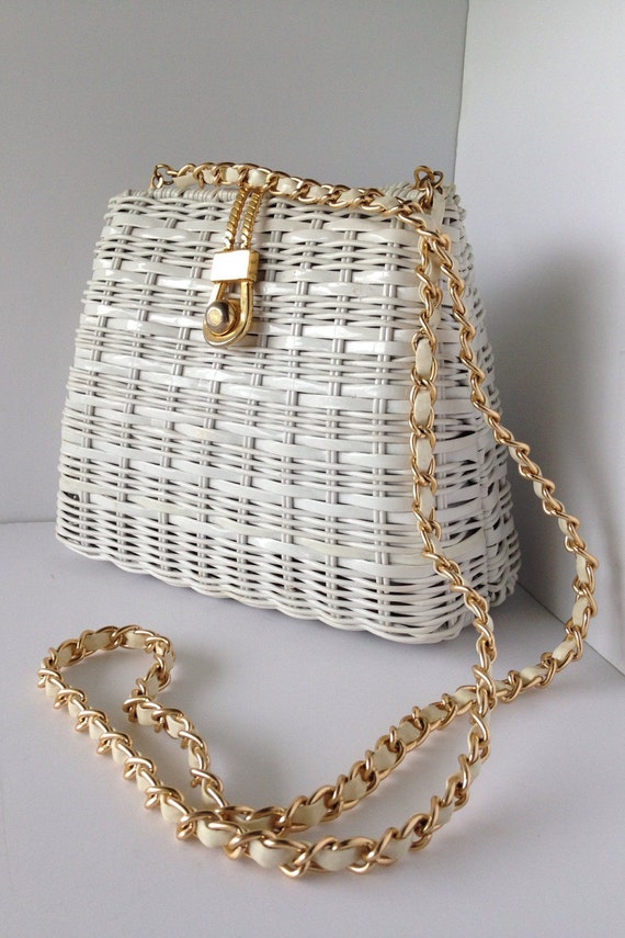 straw and white leather handbags