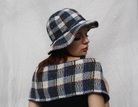 Tartan hat and scarf Traditional tartan scarves and capes, available in both lambswool and cashmere.