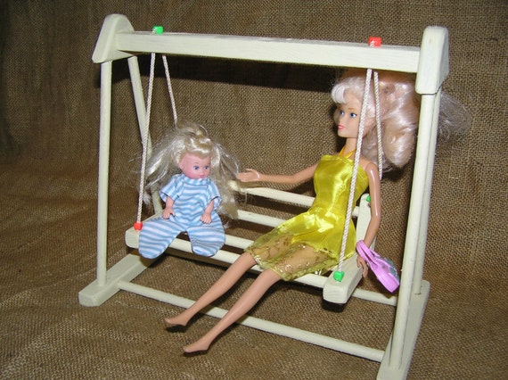 creepy doll on swing