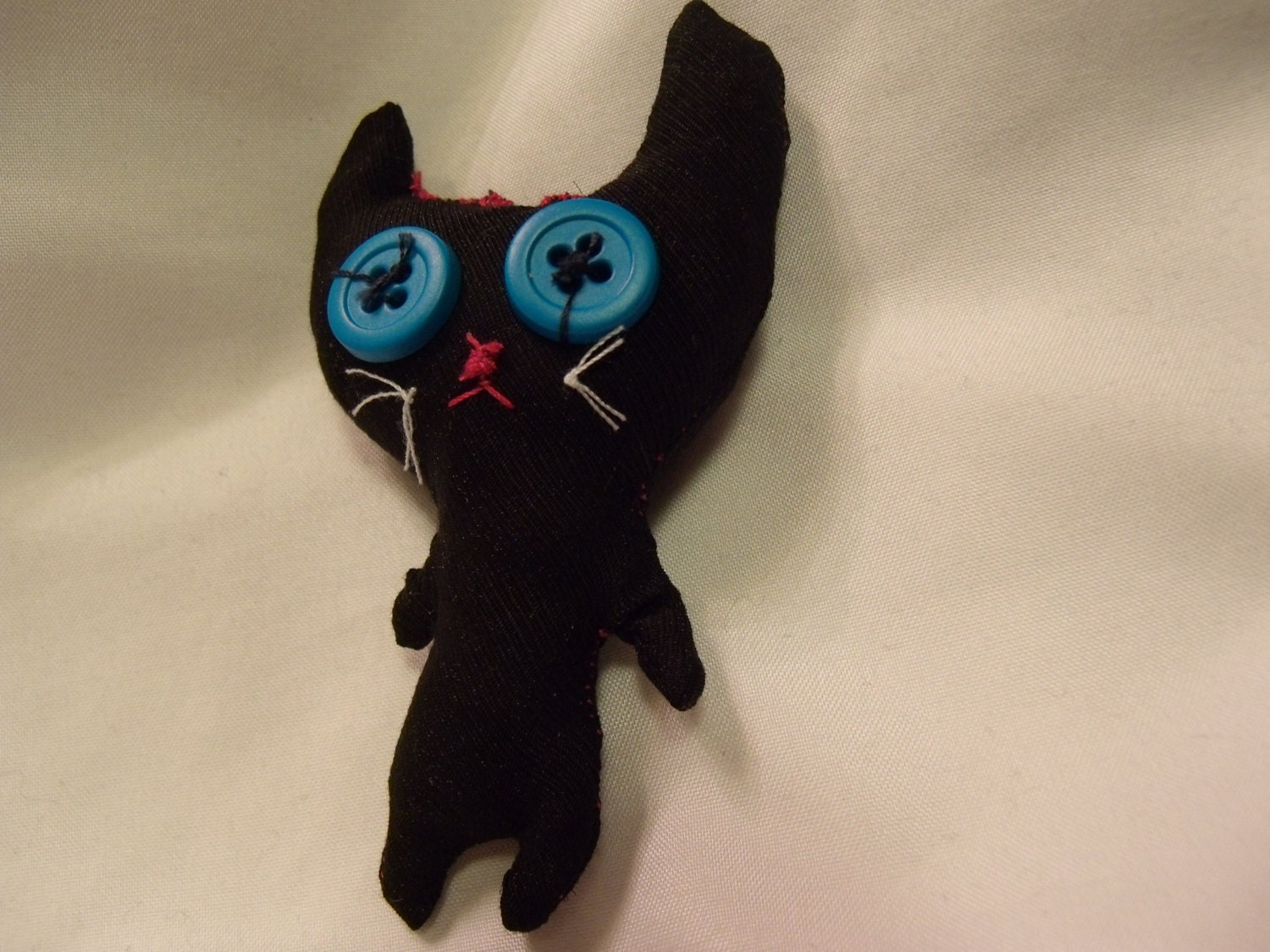 button eye plush