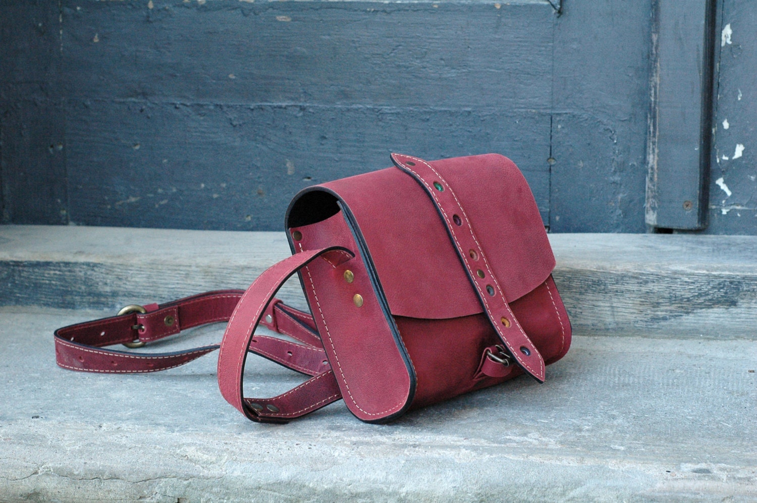 raspberry leather handbag