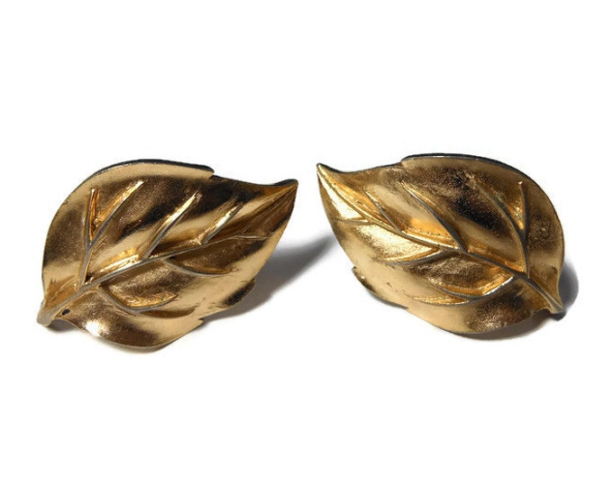 Crown Trifari earrings 1950s early 60s leaf gold clip earrings with textured sculpted veins.