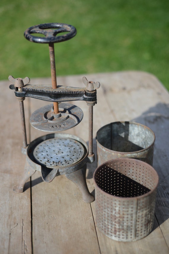 vintage fruit press or juicer