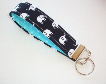 Key FOB / KeyChain / Wristlet - Black with White Elephants with white dots on aqua - coworker gift mothers day under 10