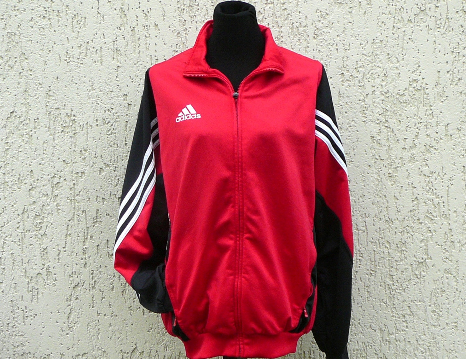 black adidas jacket with red stripes