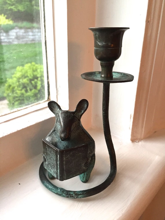 Charming figural brass/bronze candlestick of a mouse reading