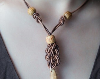 Necklace leather cord with wooden beads and Wolf tooth