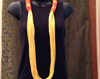 Bright yellow necklace with batik embellishment