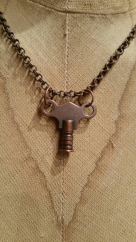Items similar to Burnished Copper Key on Burnished Copper Rolo style