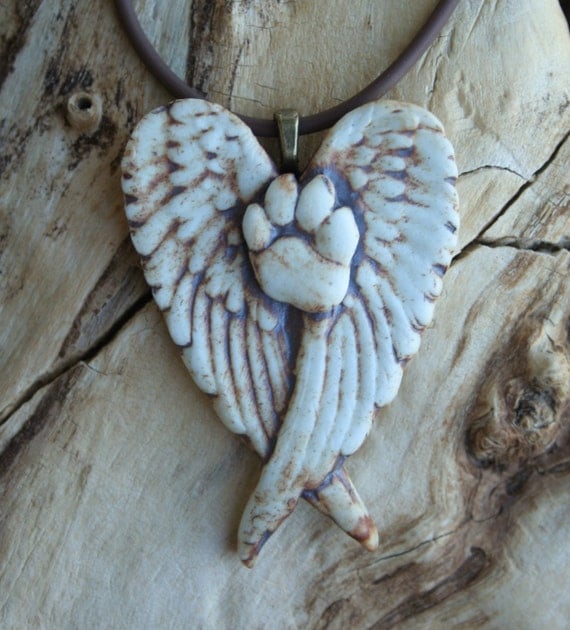 cat paw print with angel wings cat paw print with angel wings