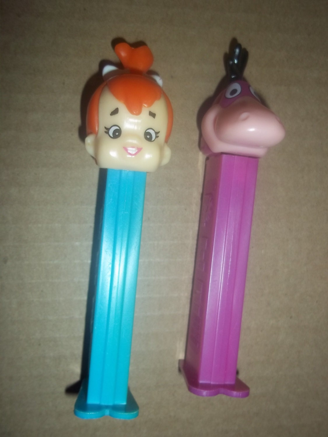 Charlie Brown Pebbles Dino pez dispensers by nancesnostalgia