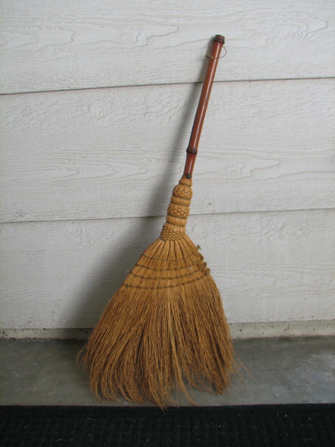vintage straw broom cover