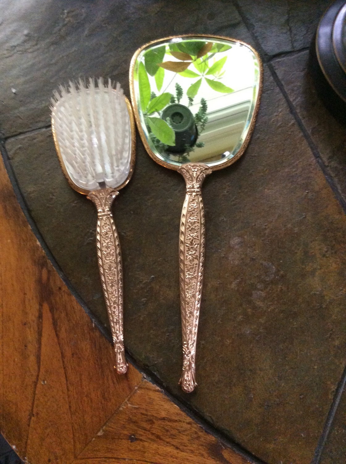 Vintage brush with hand mirror goldtone floral with silvertone