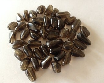 Smokey quartz tumbles smooth polished unshape polished 757 carats