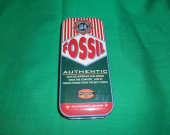 One (1), Fossil Watch, Tin Box. Circa 1993.