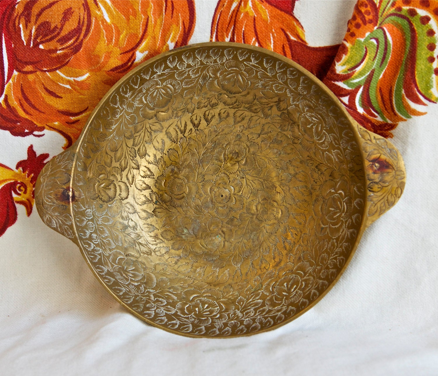 Vintage etched brass bowl with handles...floral motif.