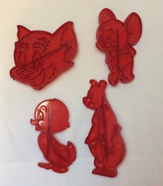Items similar to Vintage Red Plastic Cookie Cutters, 1950s