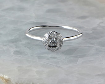 18ct white gold illusion set Diamond ring.
