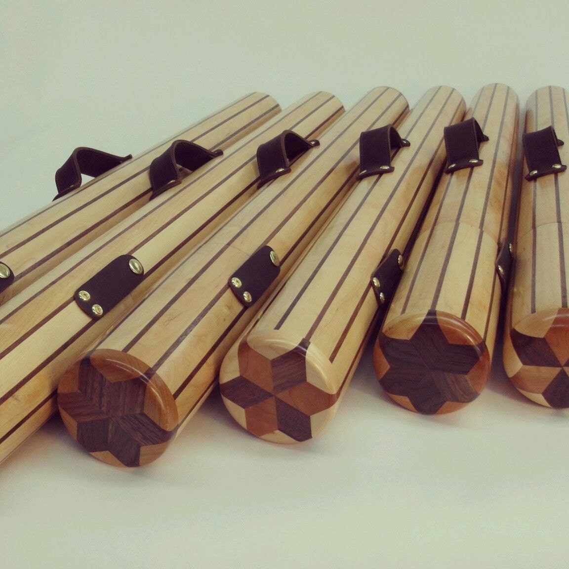 Handmade wooden fly rod fishing case with leather and brass