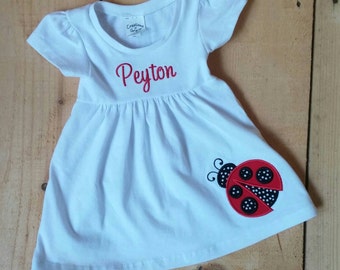 Personalized White Cap Sleeve Cotton Dress with Ladybug and Monogrammed Name or Monogrammed Initials. Size 3 months-4T