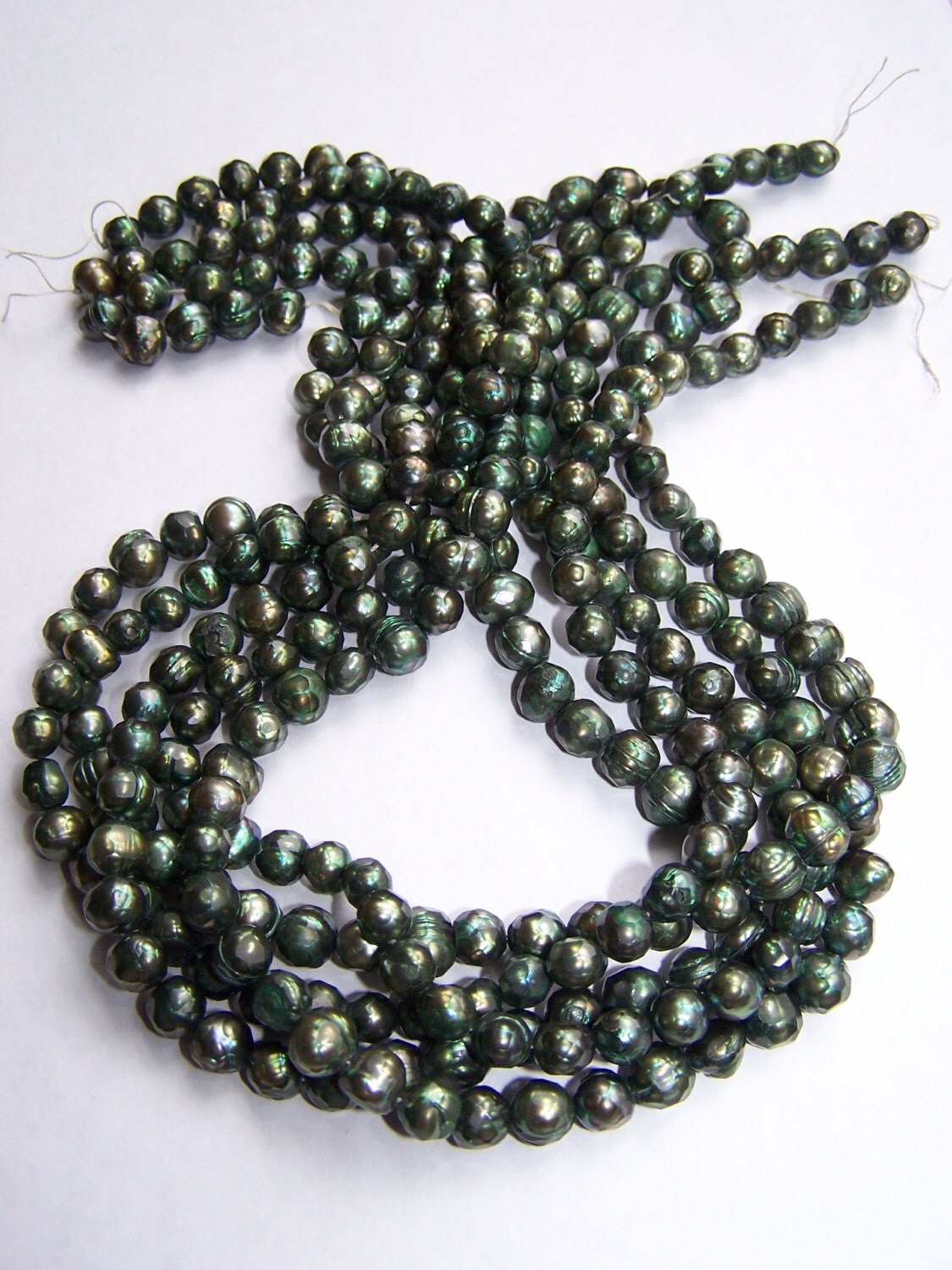 Faceted Green Freshwater Pearls 67mm 15.5 inch strand from