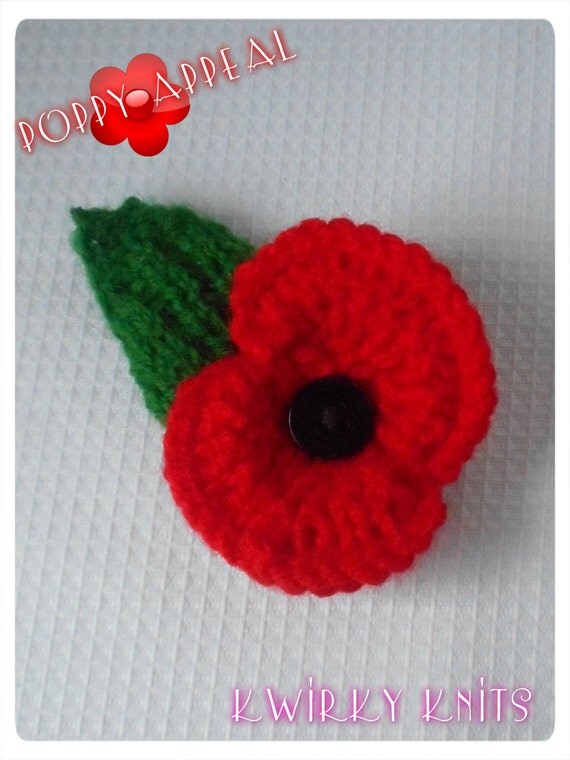 Poppy appeal. Knitted poppy brooch with leaf. pin brooch.