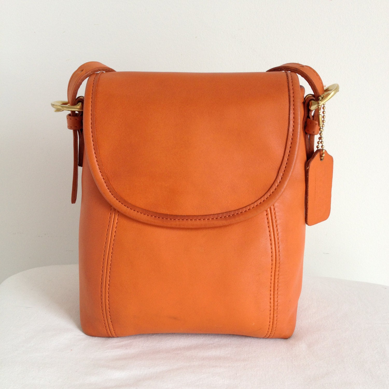 blue and orange coach purse