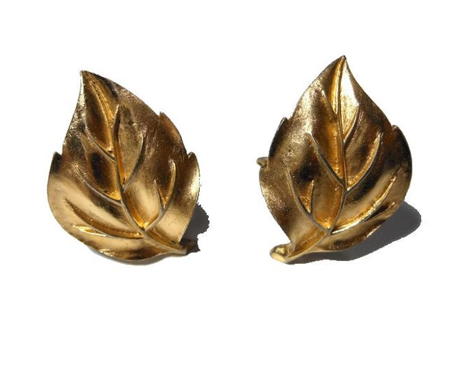 Crown Trifari earrings 1950s early 60s leaf gold clip earrings with textured sculpted veins.