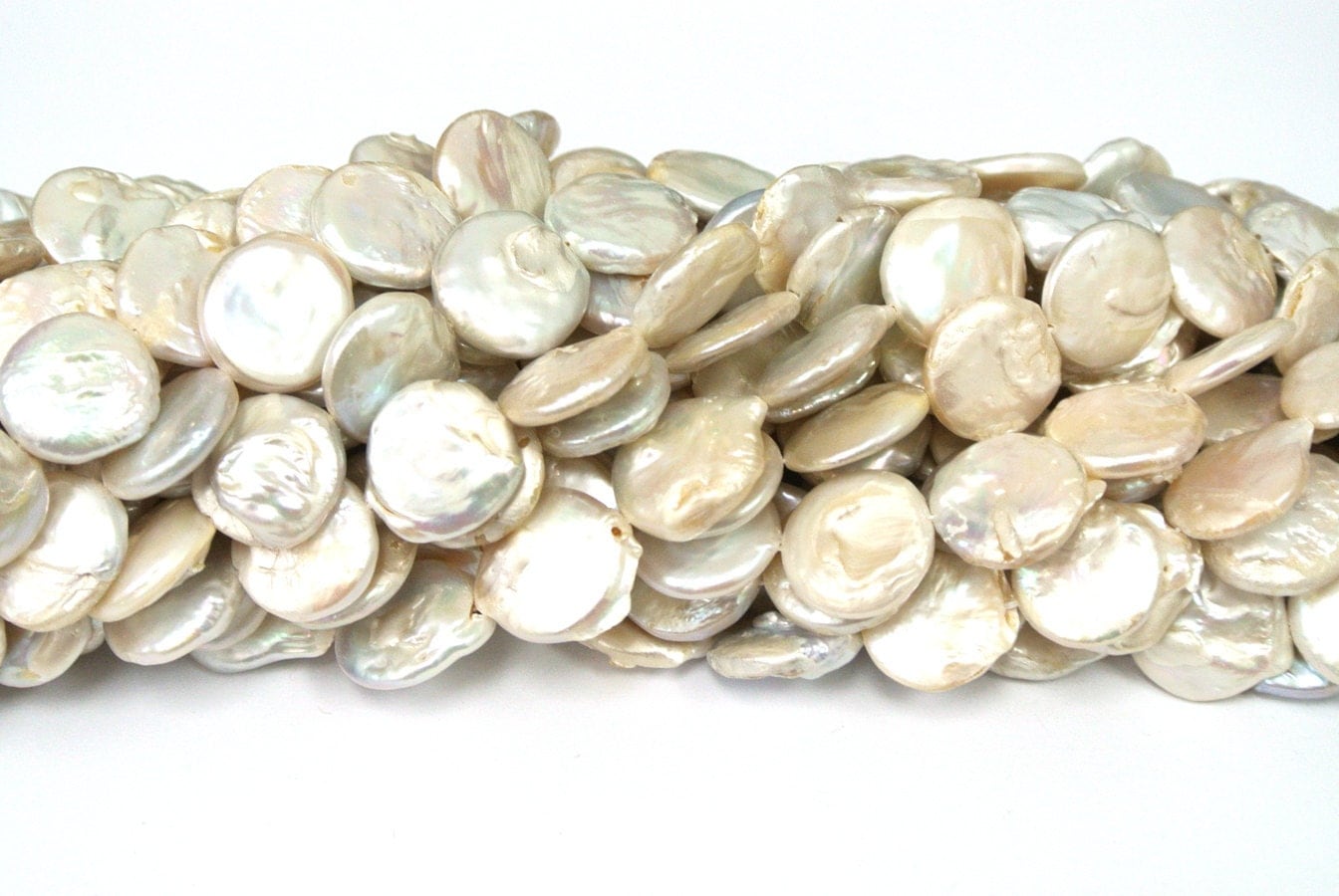 white flats with pearls