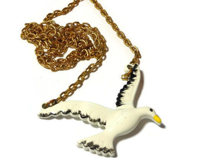 FREE SHIPPING White seagull necklace pendant, white enamel seagull with gold tone chain, yellow beak and black fringe on ends of feathers