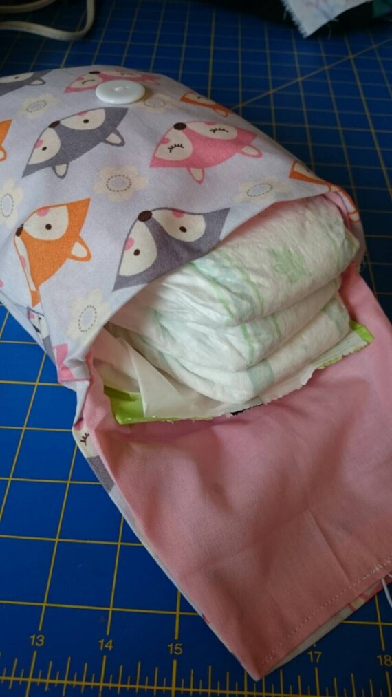 Fox Diaper and wipe clutch with button
