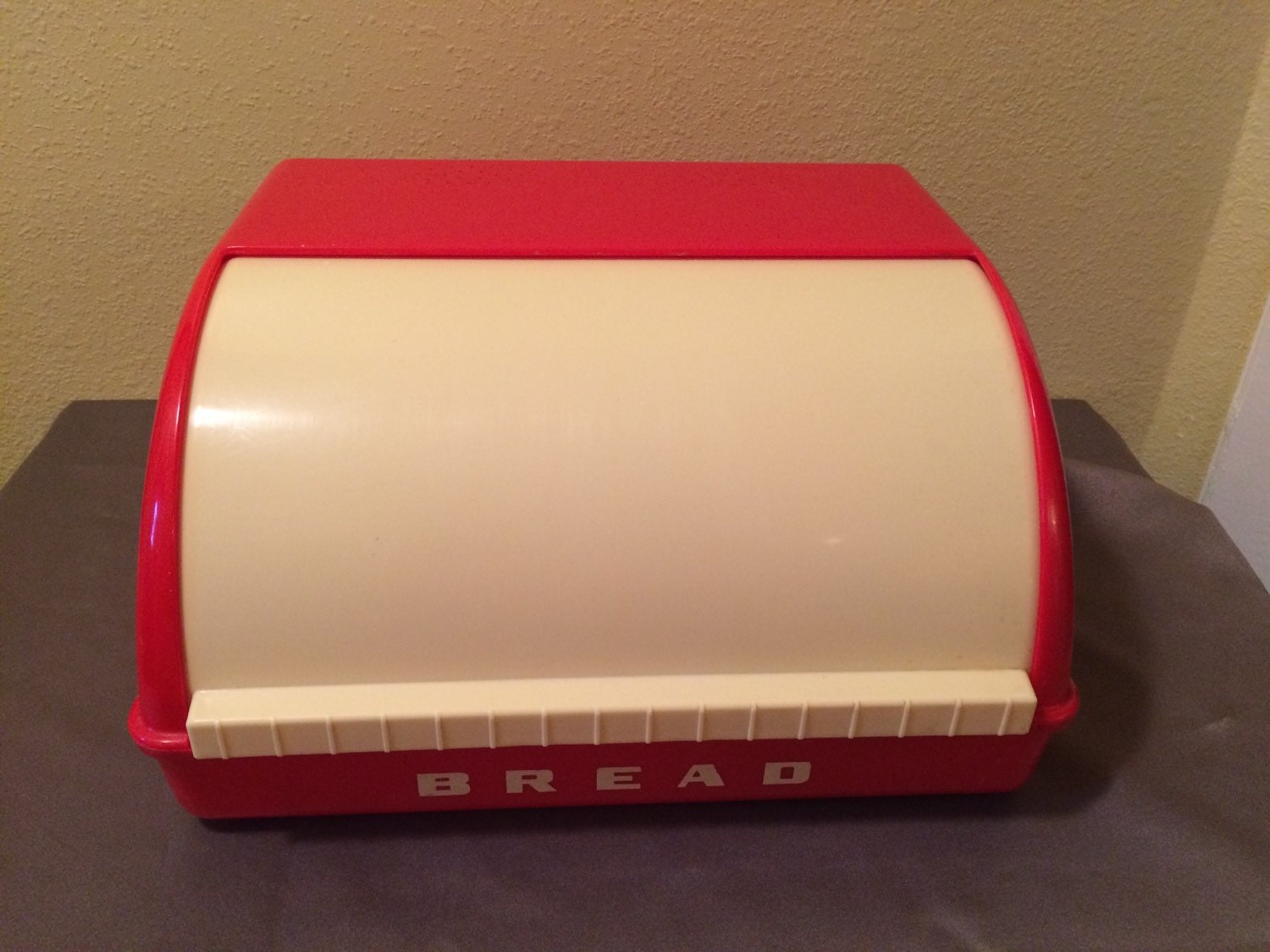 Red plastic breadbox