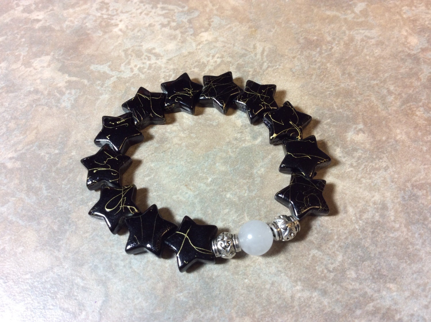 Black Stars handmade bracelets with charms. by LaBelleViolet