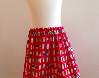 Girls skirt, red with window pattern,