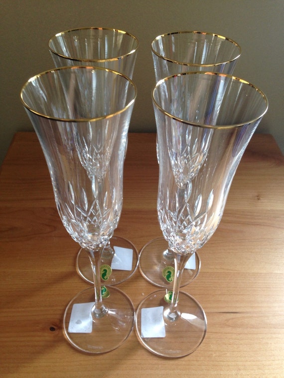 Waterford lismore crystal flutes with Gold rim. by Ziegratrades12