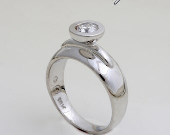 Diamond and 18 ct. White Gold handmade Engagement Ring set with 0.25 ct. Brilliant cut Diamond