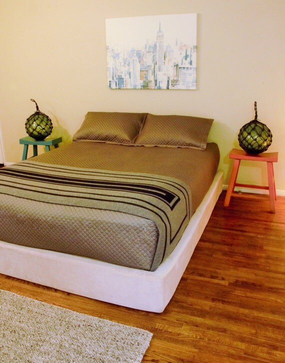 Stylish and luxuriously padded modern bed frame by SoftFrame