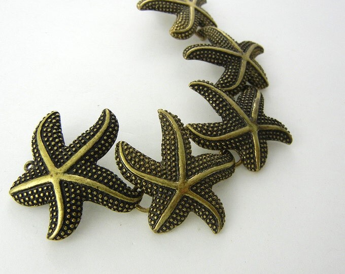 5 Burnished Gold-tone Starfish Charms Linked