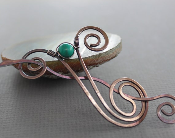 Shawl pin or scarf pin in snail shape with teal color