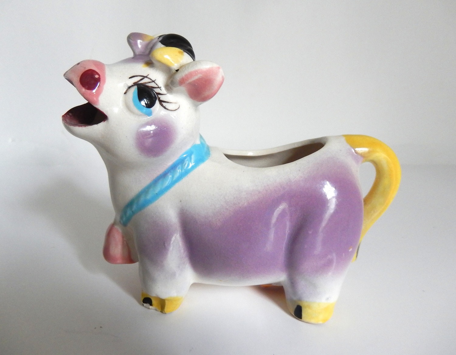 vintage purple cow figurine