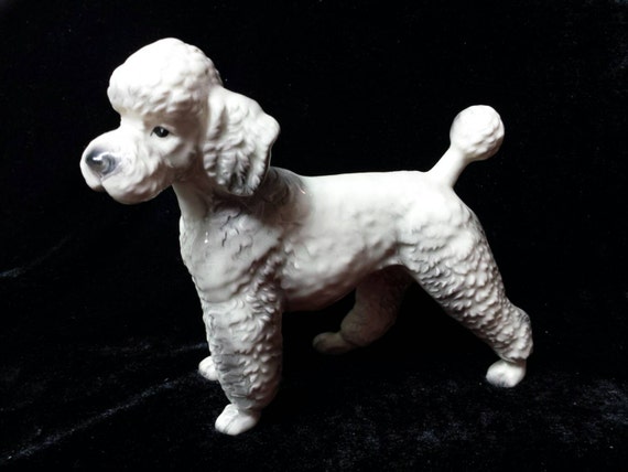 white ceramic poodle