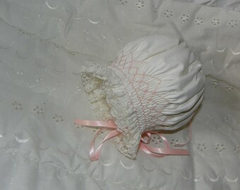 Newborn bonnet - White with Pink smocking