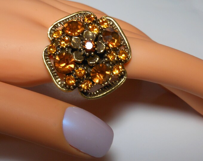 FREE SHIPPING Florenza cocktail ring amber and rootbeer rhinestones with floral top, adjustable
