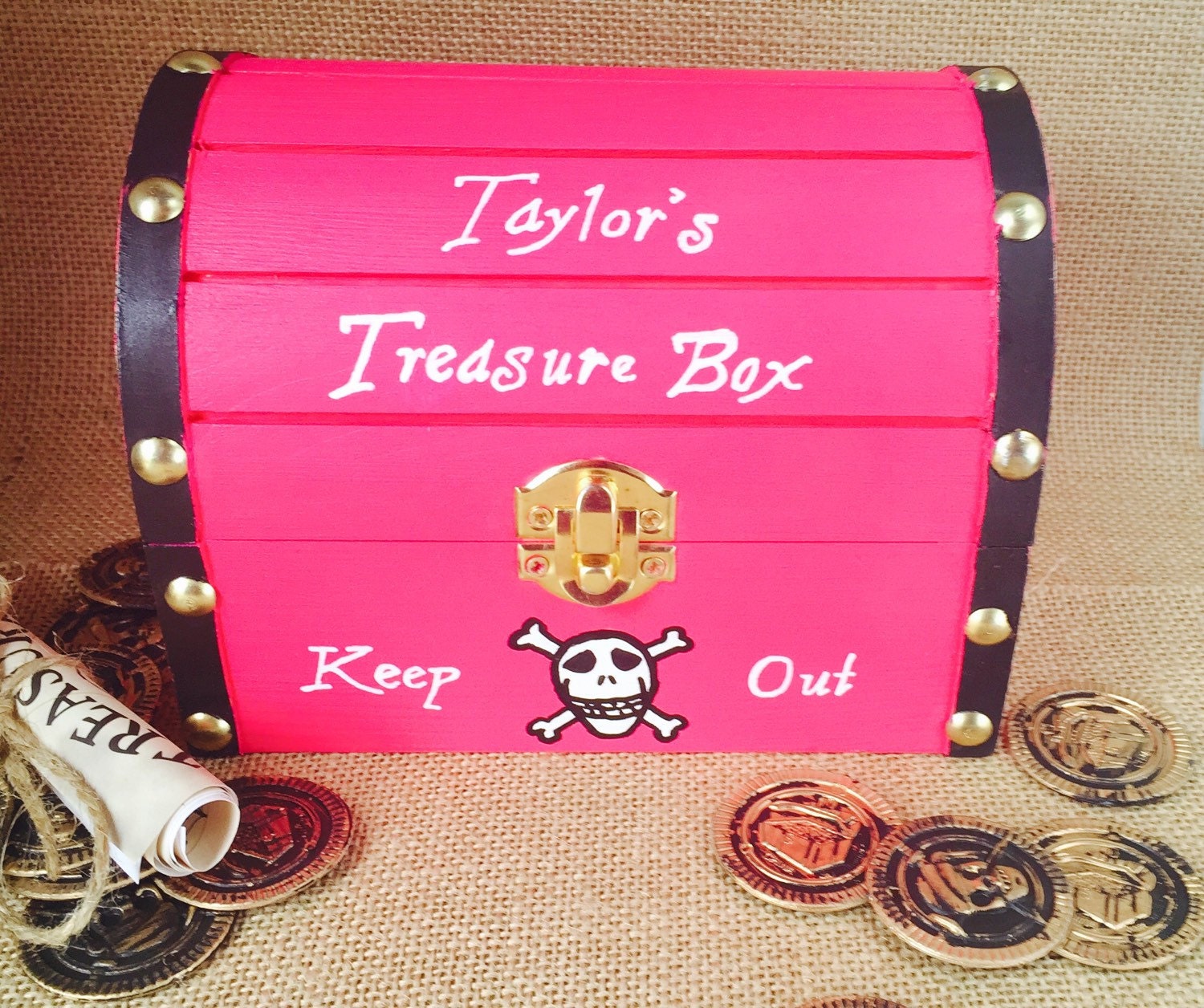 a picture of an open treasure box with pretty pink gems