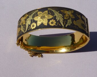A Vintage Damascene black and gold cuff bangle bracelet