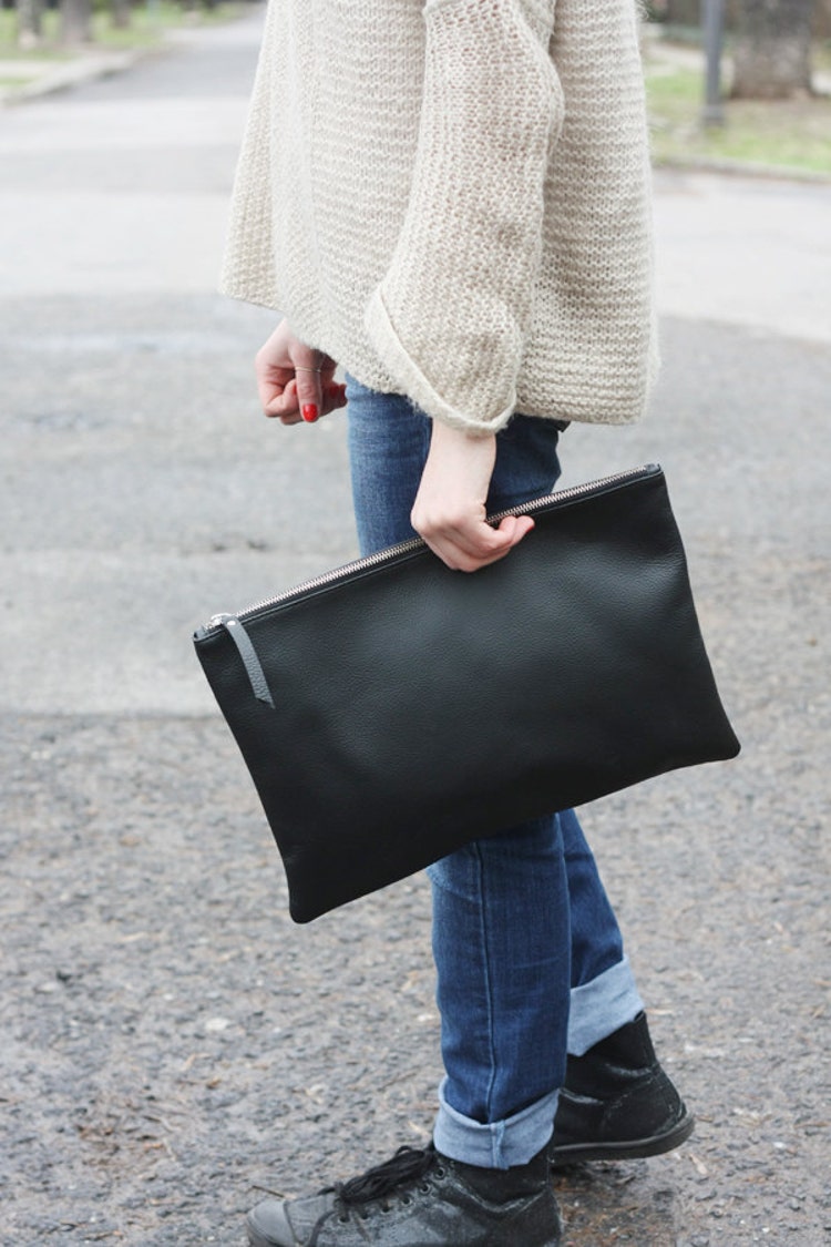 oversized black leather clutch bag